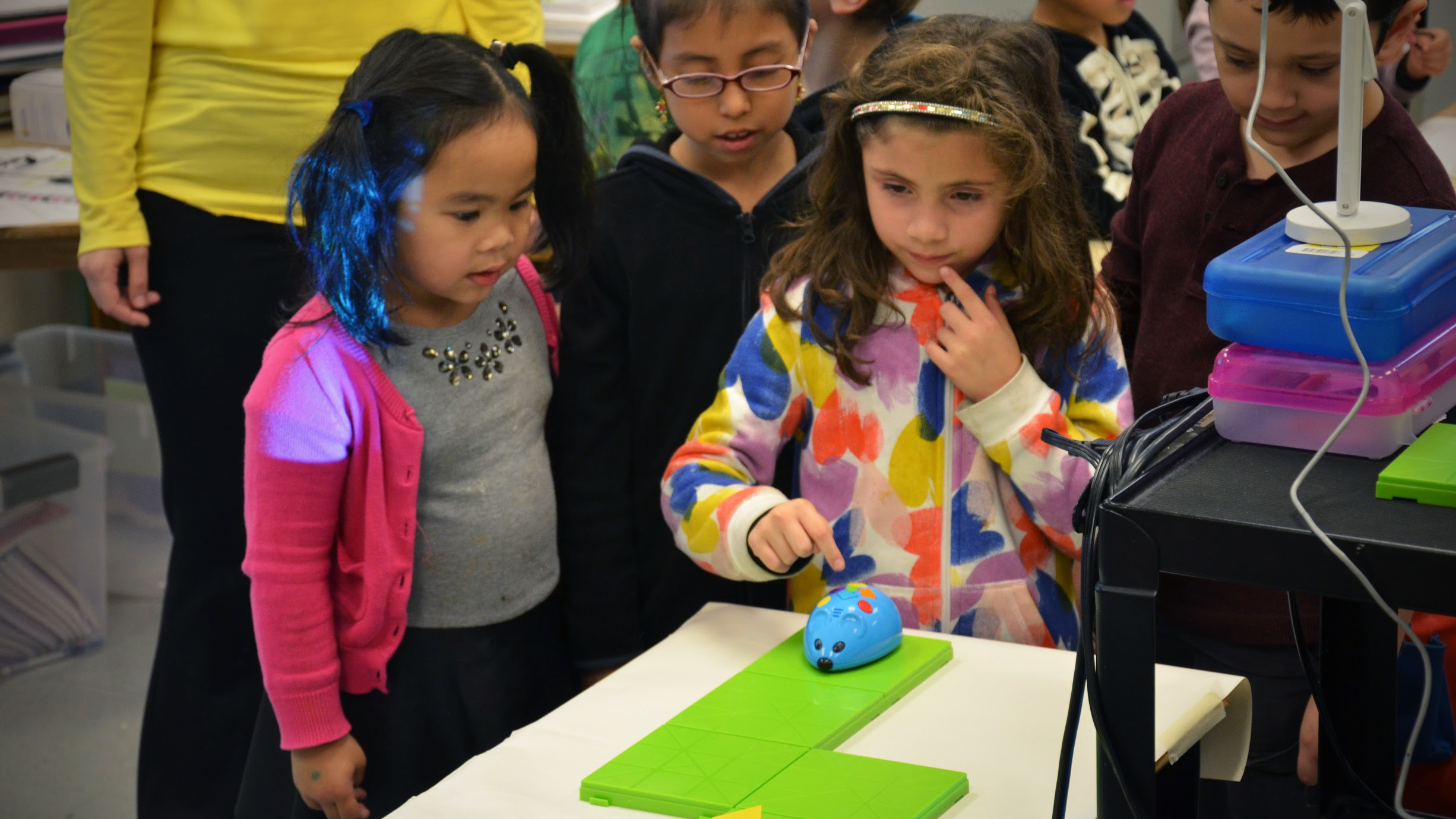 students with toy mouse